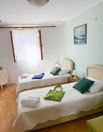 Green Aura Studio twin bedroom