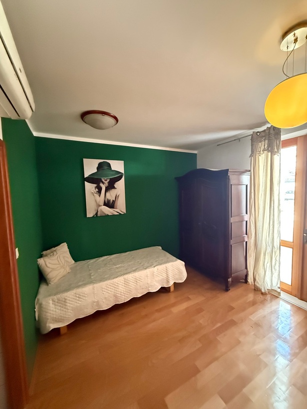 Green Orange Room with its green accent walls